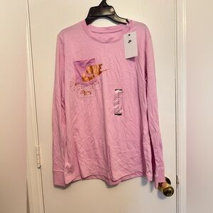 Nike Women's NSW Icon Clash Pkt Top in a pink Size M